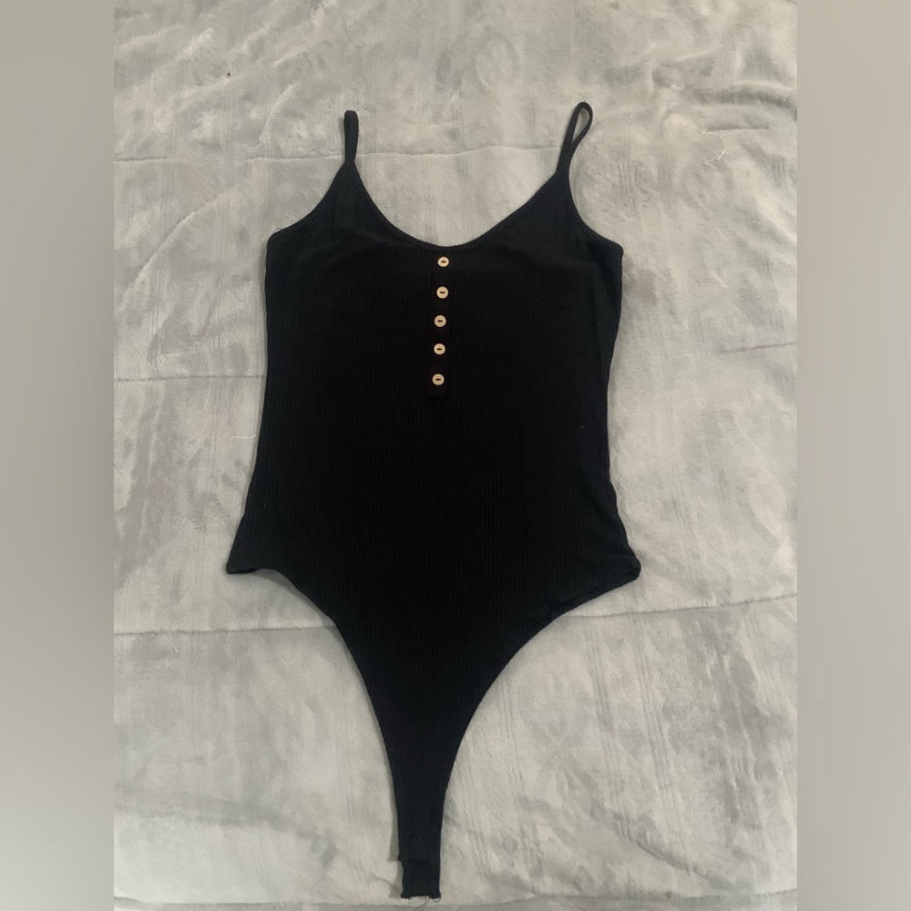 Fashion Nova snap together one piece under the pants.